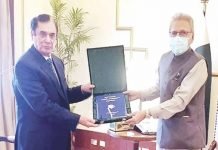 Chairman NAB presents annual report of bureau to President Alvi