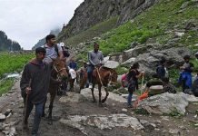 Indian occupied Kashmir under strict lockdown, Hindu pilgrimage cancels as COVID-19 cases surge