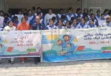 REEDS Pakistan Champions Vaccine Awareness During World Immunization Week in Rawalpindi Group of students and health officials walking with banners during a World Immunization Week awareness event in Rawalpindi, Pakistan, 2025.