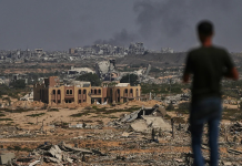 Behind the High-Stakes Power Struggle in the Middle East Conflict-torn Middle Eastern city showing the devastation and cost of the regional power struggle