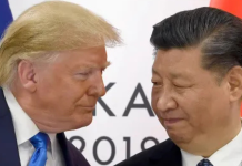 Trump’s Gamble: Internal Chaos, External Confrontation Donald Trump and Xi Jinping facing off symbolically over trade tariffs, representing U.S.–China economic confrontation.