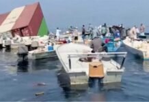Two ships sink near Strait of Hormuz after projectile attacks Two Ships Sink Near Strait of Hormuz After Projectile Attacks